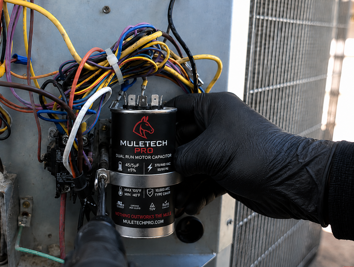 Mount the new capacitor and close up the unit